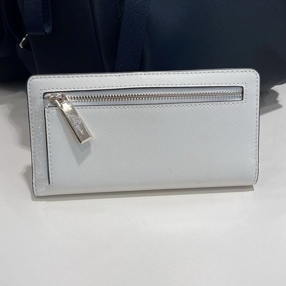 Kate Spade Madison Large Slim Bifold Wallet
Meringue 
NWT - Picture 5 of 16